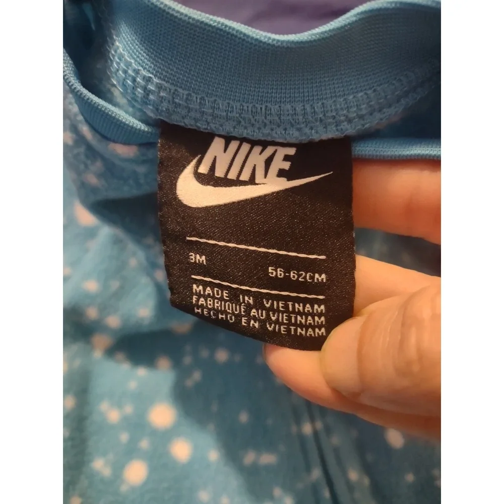 Nike footed baby
